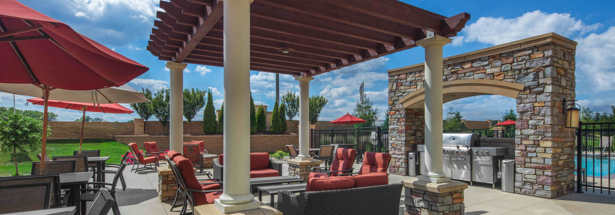 Exterior barbeque space at The Tuscany On Pleasant View in Madison, Wisconsin