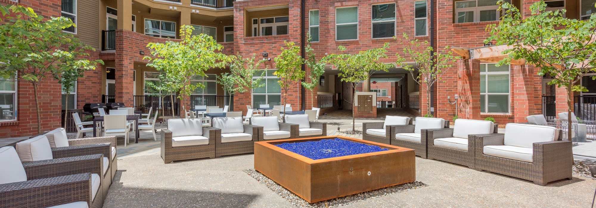 Outdoor barbeque area at Overton Row in Charlotte, North Carolina