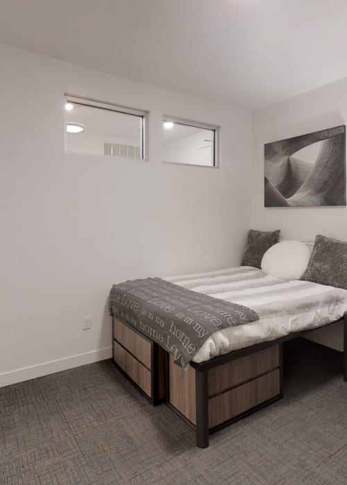 Very spacious bedroom with carpets and lots of storage under the bed at The View on Pavey Square in Columbus, Ohio
