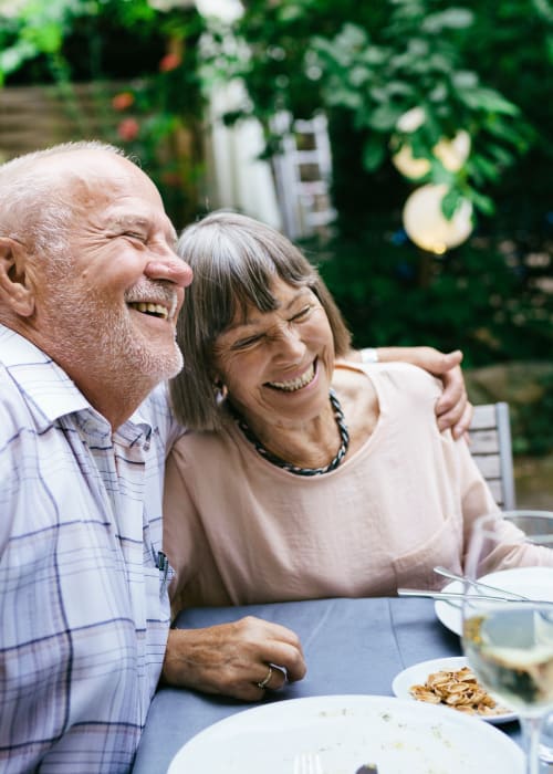 Couple dining at Grand Villa of Clearwater in Clearwater, Florida