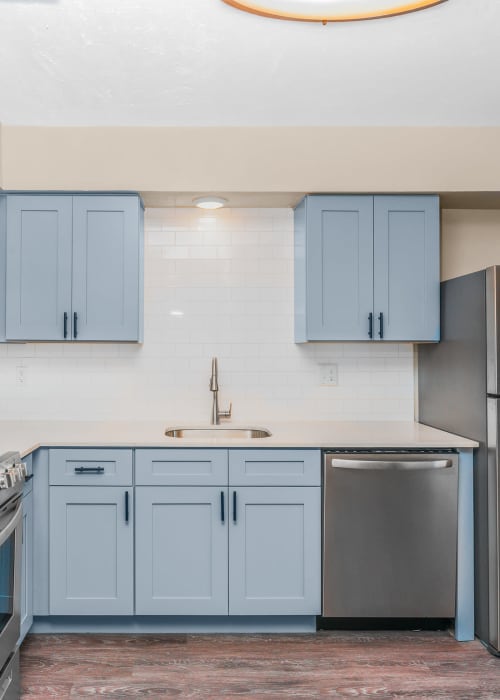Renovated kitchen at  Barrett Apartment Homes in Garland, Texas