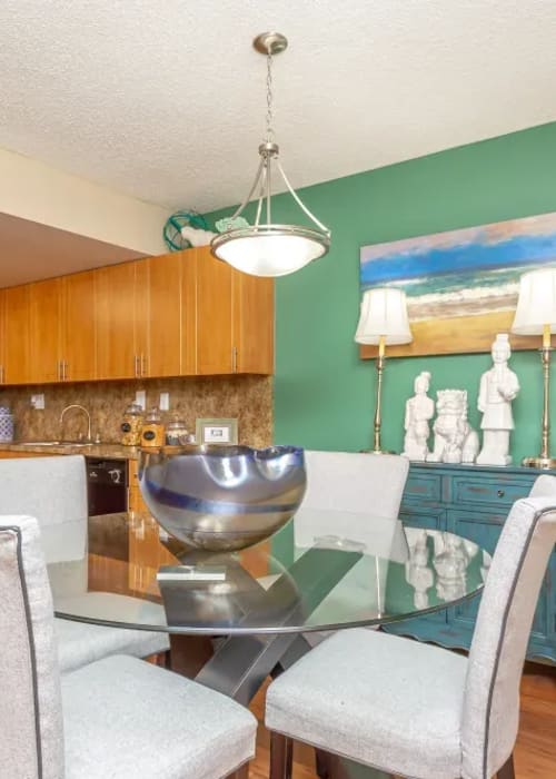 A dining room table in a model apartment at Fairway View in Hialeah, Florida