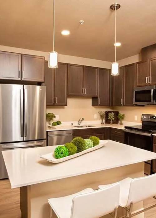 Gourmet kitchen with pendant lighting at Allure Apartments in Modesto, California