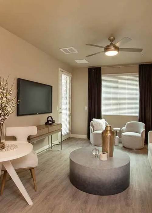 Living room of a model apartment at Allure Apartments in Modesto, California