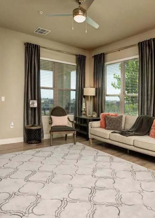 Minimalist living room at Allure Apartments in Modesto, California