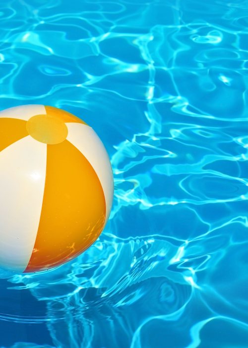 swimming pool with a ball at Washington Village Apartments in Greenfield, Indiana
