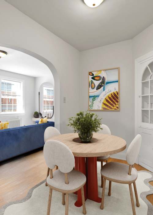 A dining room table in a model dining area at 1005 Grove Ave Apartments in Richmond, Virginia