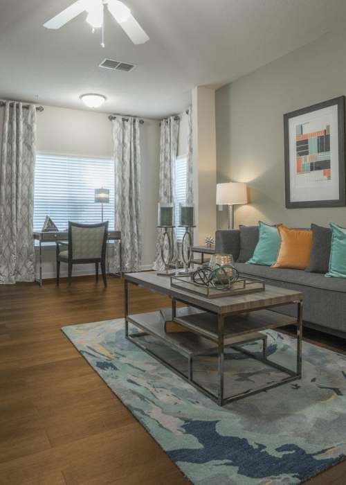 Living room with coffee table at The Haven At West Melbourne in West Melbourne, Florida