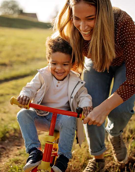 Child playing with her mother at The Indie Glendale Collection in Glendale, California