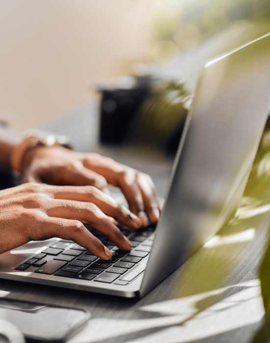 Resident working in laptop at The Indie Glendale Collection in Glendale, California