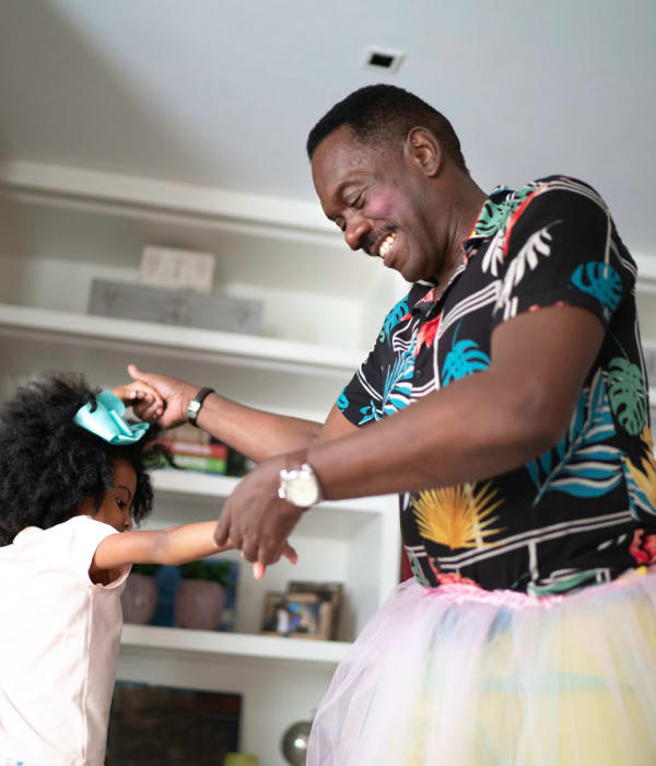 Future resident enjoying a respite stay with his granddaughter at Pacifica Senior Living Burlingame in Burlingame, California