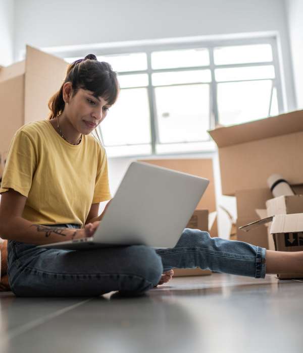A customer paying her bill online near Storage Hub - Redland in San Antonio, Texas