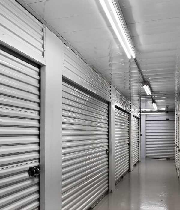 An elderly couple with boxes in their house near Storage Hub -  Hickory in Metairie, Louisiana Storage Hub -  Hickory in Metairie, Louisiana