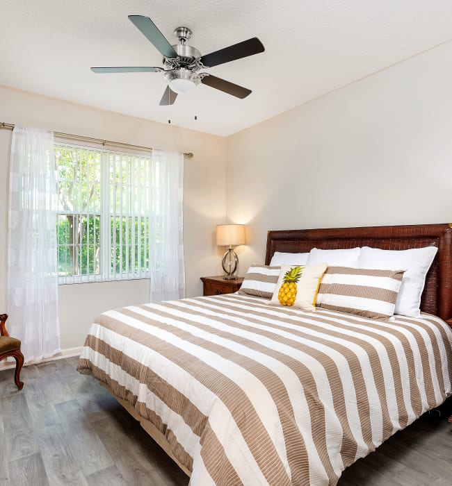 Model bedroom at Delray Bay Apartments in Delray Beach, Florida