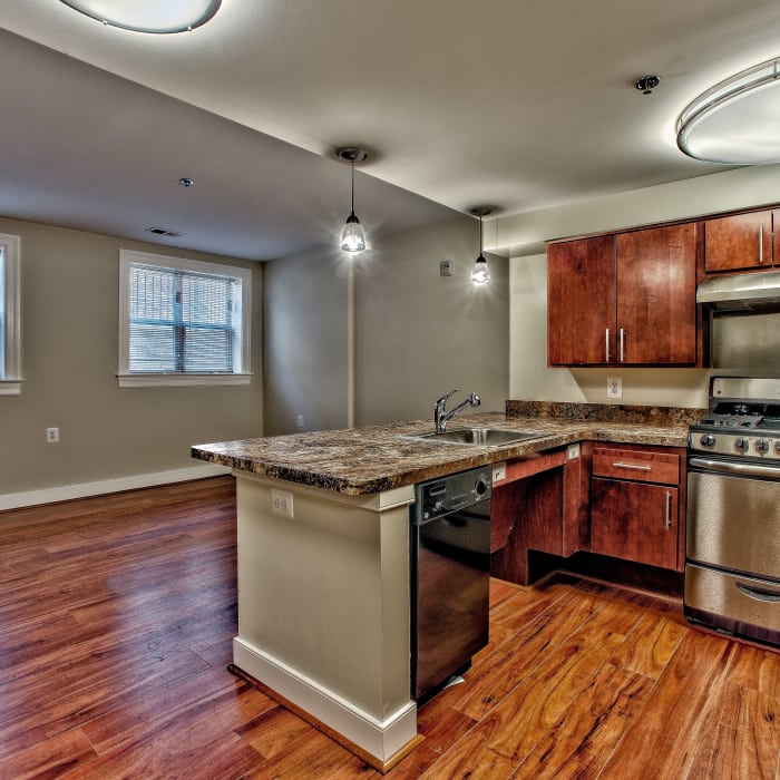 Modern kitchen at Monsenor Romero Apartments in Washington, District of Columbia