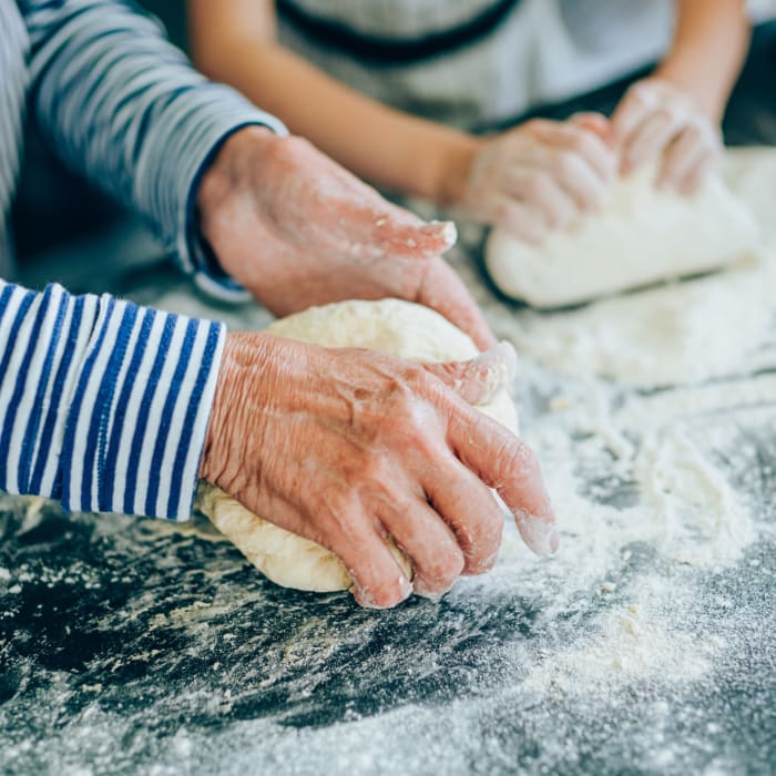 Kneading bread at Innovation Senior Living in Winter Park, Florida