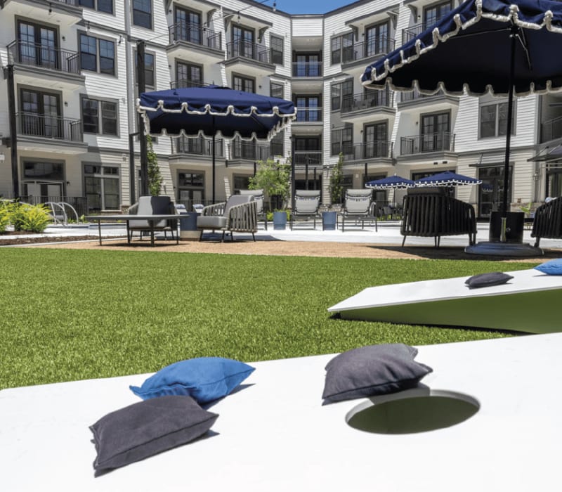 Cornhole on the amenity at The Everly at Rouzan in Baton Rouge, Louisiana