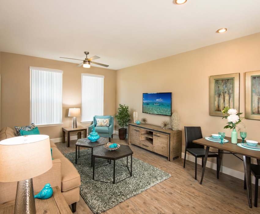 Living Room with ceiling fan at Southern Avenue Villas