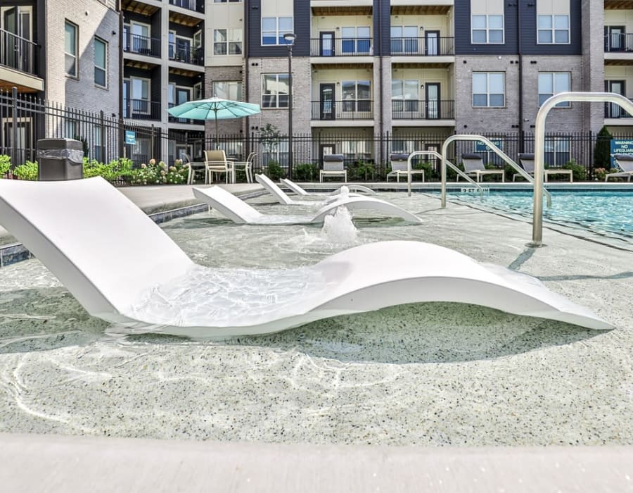 Poolside seating at The Rey on Reynolds in Duluth, Georgia