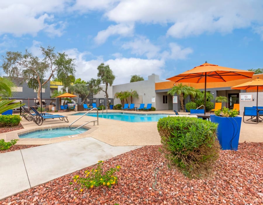 Relax and lounge by our swimming pool at Newport in Avondale, Arizona