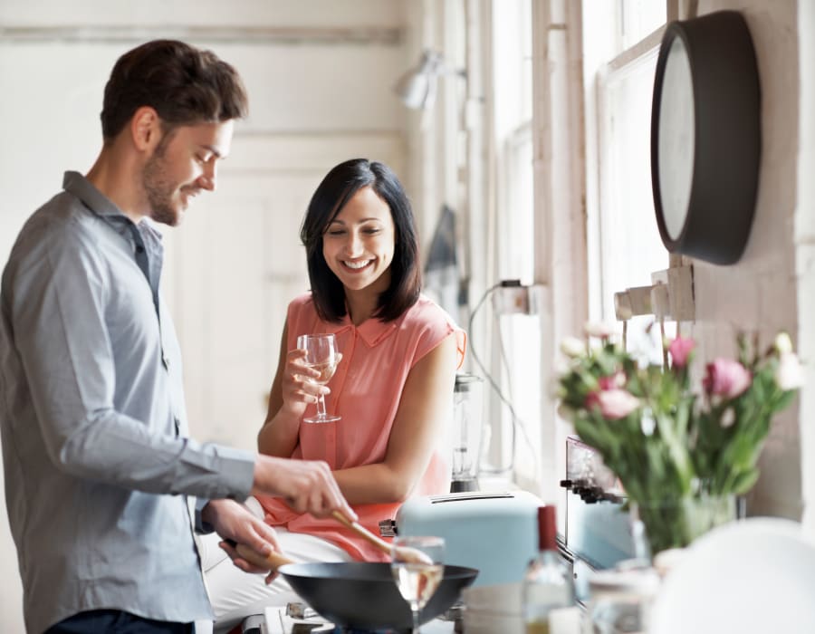 Resident couple cooking at home at University Garden in Athens, Georgia