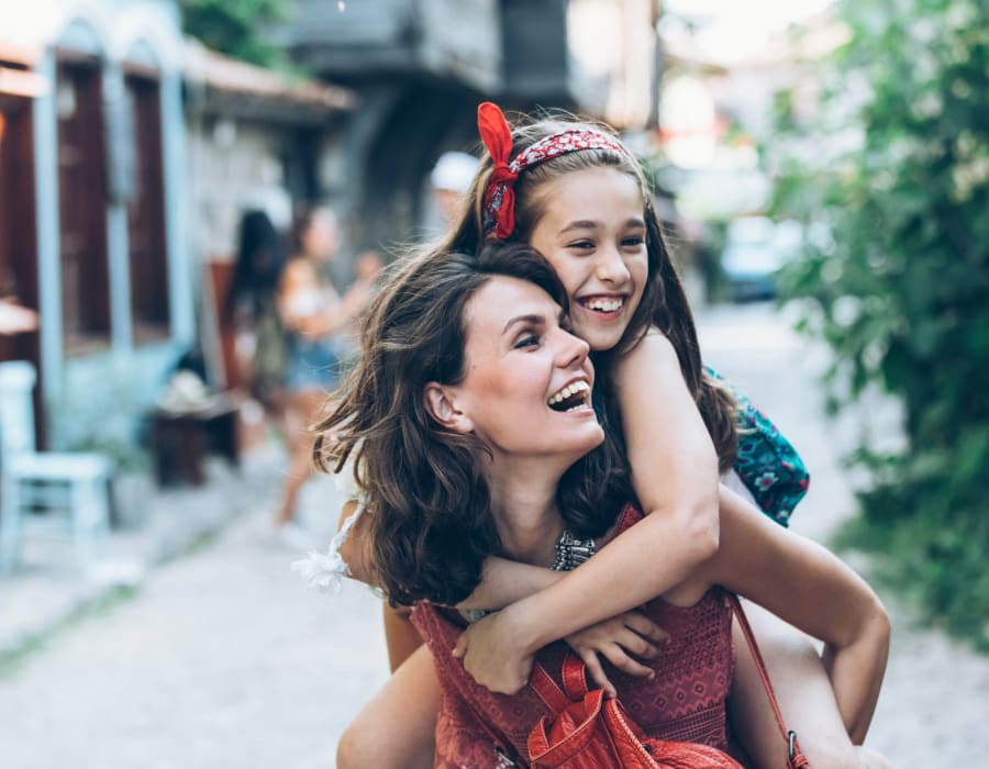 Resident and her daughter walking around outside near 2800 Tranquility in Pearland, Texas