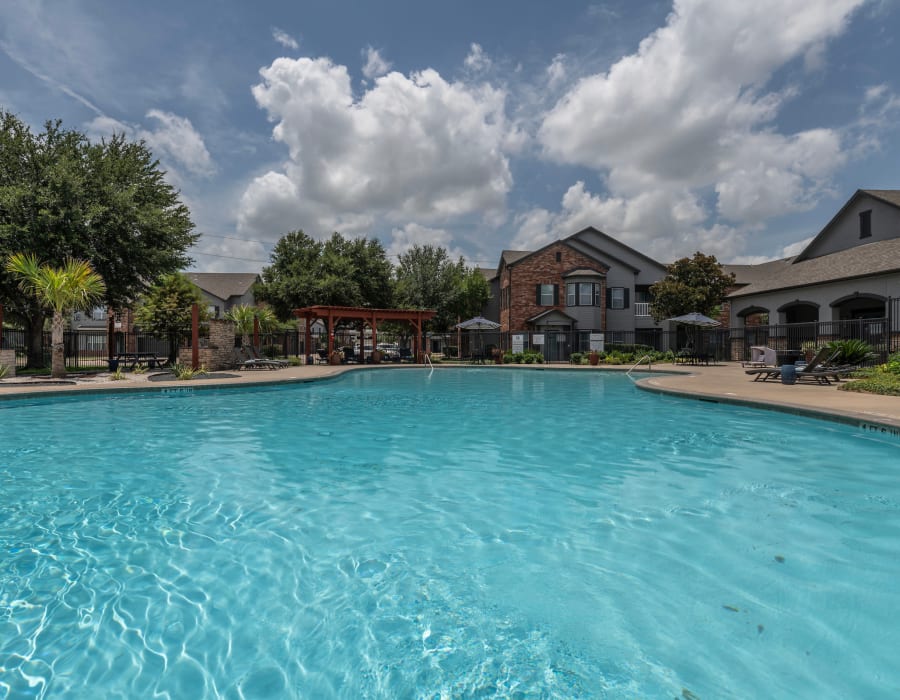 enticing Community pool at The Spencer Park Row in Houston, Texas