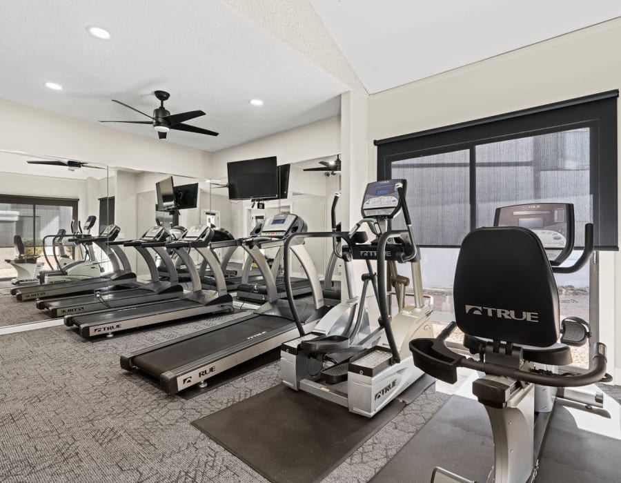 Residents working out in our fitness center at Aventura Apartments in Tucson, Arizona