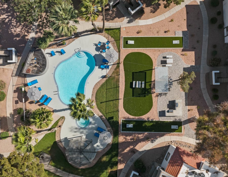 Relax and lounge by our swimming pool at Aventura Apartments in Tucson, Arizona