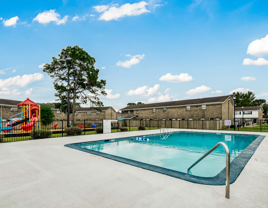 Fenced pool and playplace at Patriot's Place Townhomes in Goose Creek, South Carolina