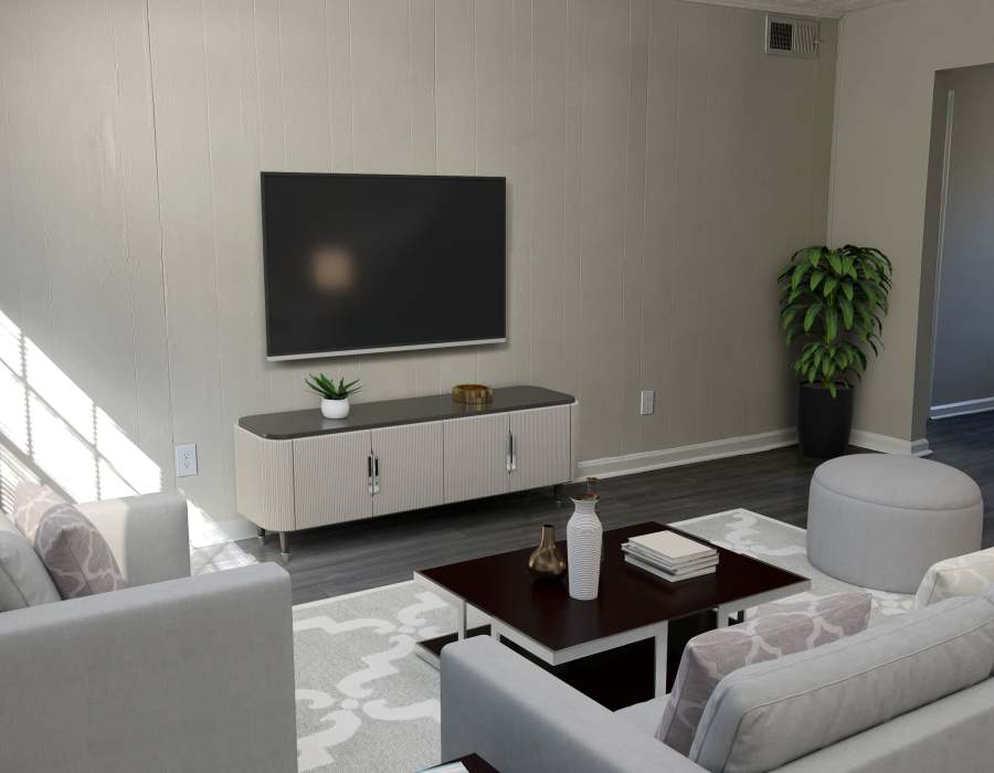 Apartment model living room with a wall mounted tv at Flats @ 235 in Athens, Georgia