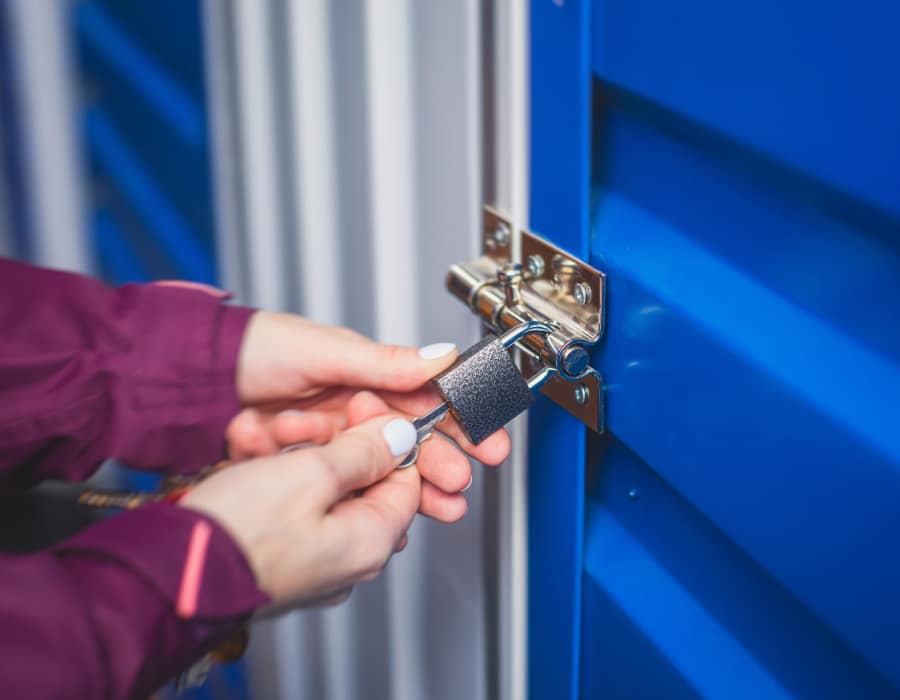 Person locking year at Storage Hub - Redland in San Antonio, Texas 
