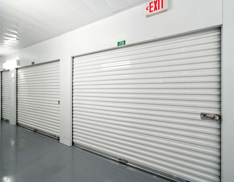 Person locking year at Storage Hub - Redland in San Antonio, Texas 