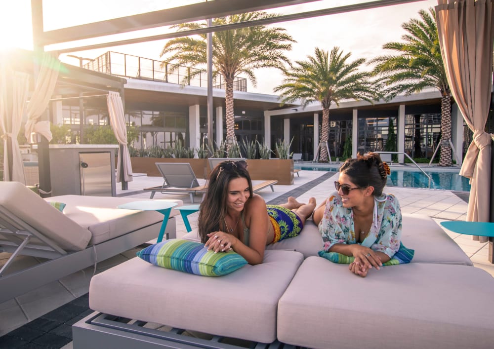 Relaxing on the cabanas by the pool at Motif in Fort Lauderdale, Florida