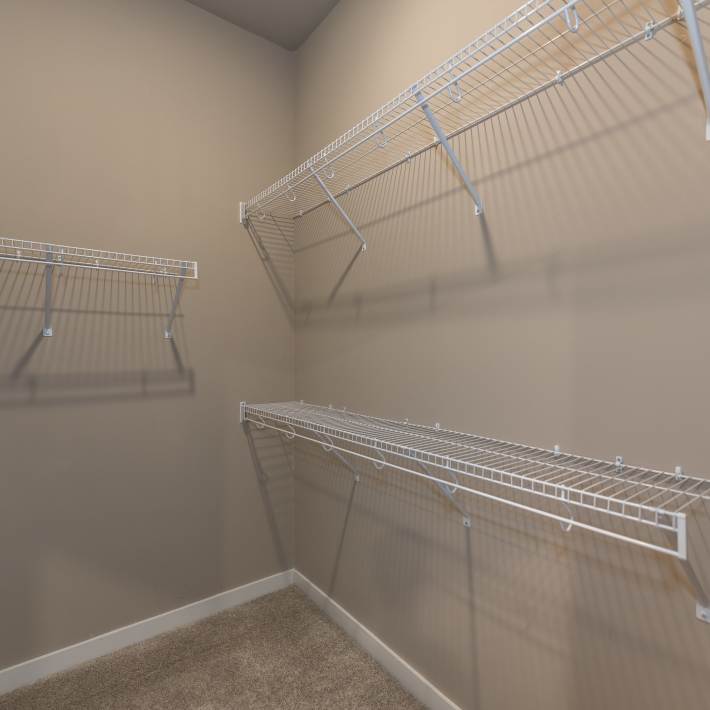 Walk-in closet at Acclaim at Cary Pointe in Cary, North Carolina