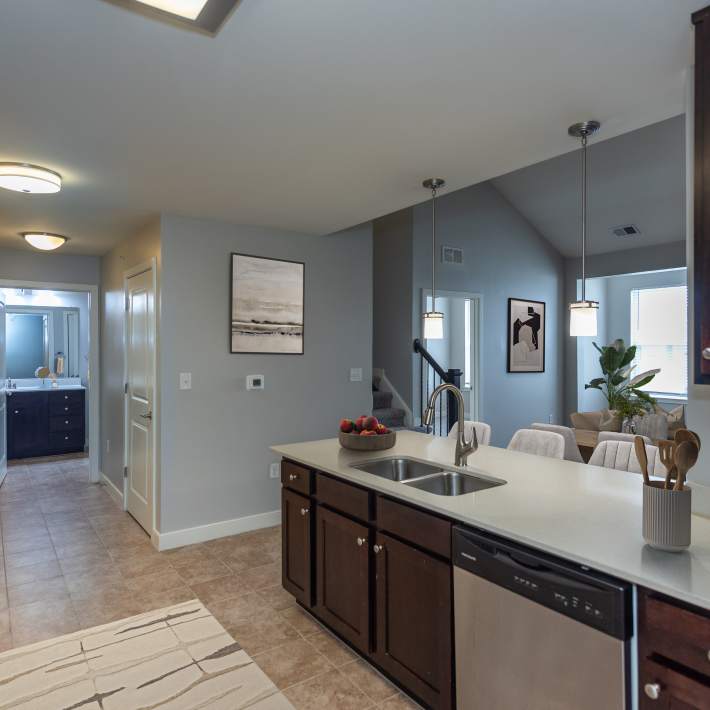 Bathroom with cabinetry, sink and mirror at Solace Apartments, Virginia Beach, Virginia  