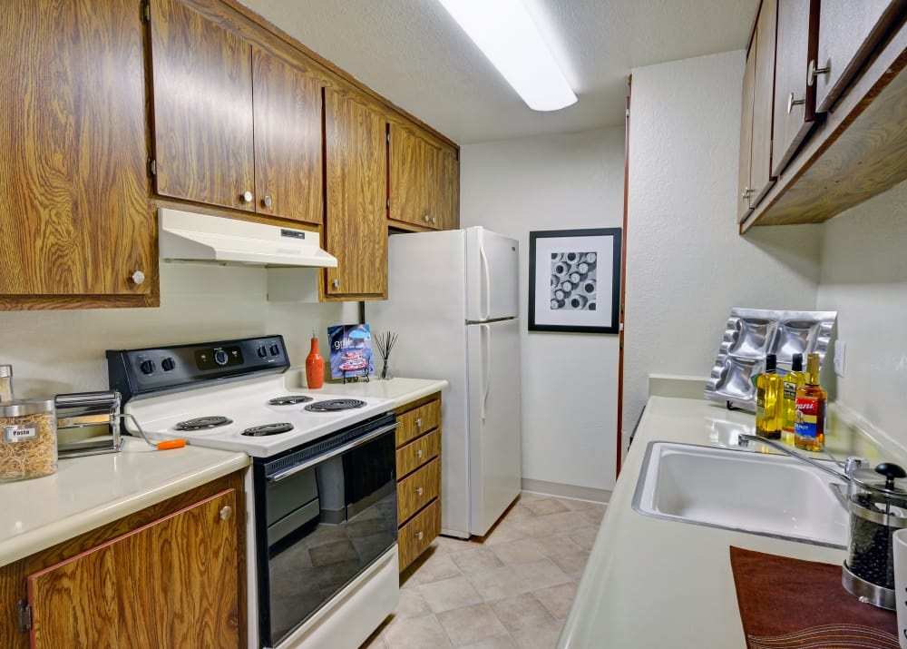 A fully equipped kitchen at Avery Park Apartments
