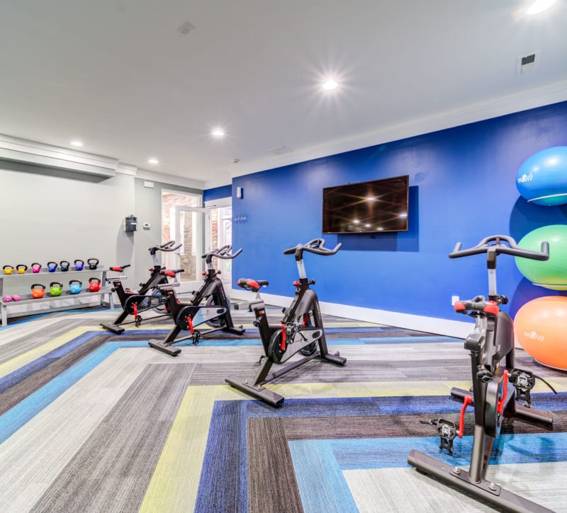A fitness center with plenty of spin bikes at 7029 West in Greensboro, North Carolina