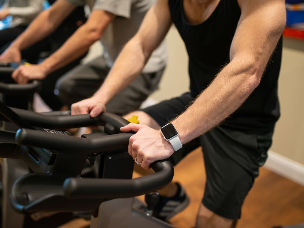 Residents staying in shape in the fitness center at San Privada in Gilbert, Arizona
