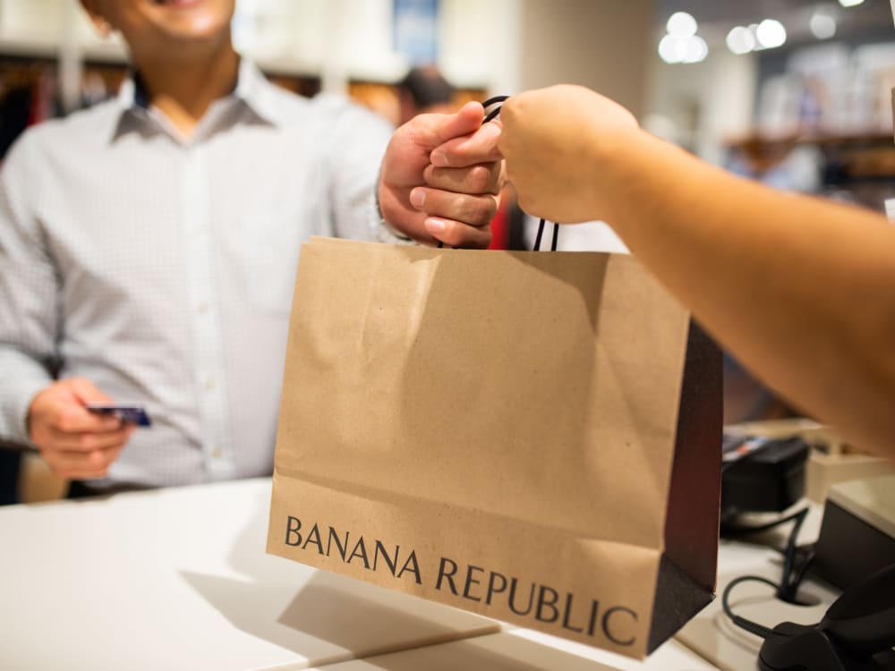 Resident finishing up some retail shopping near The Regents at Scottsdale in Scottsdale, Arizona