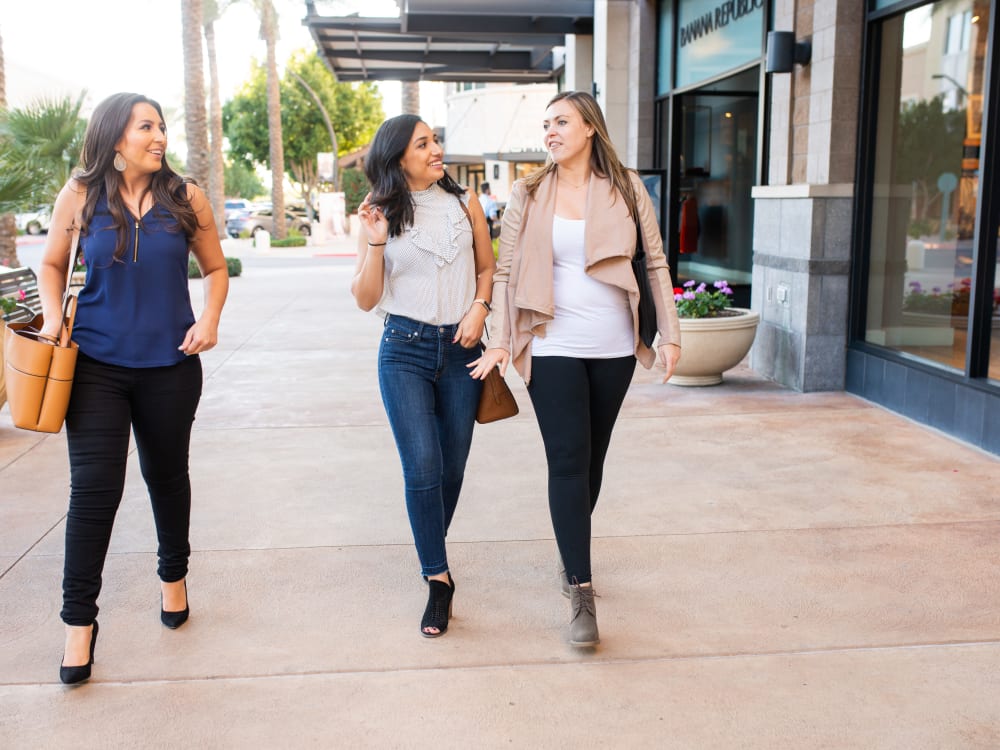 Resident friends walking around downtown near The Reserve at Gilbert Towne Centre in Gilbert, Arizona