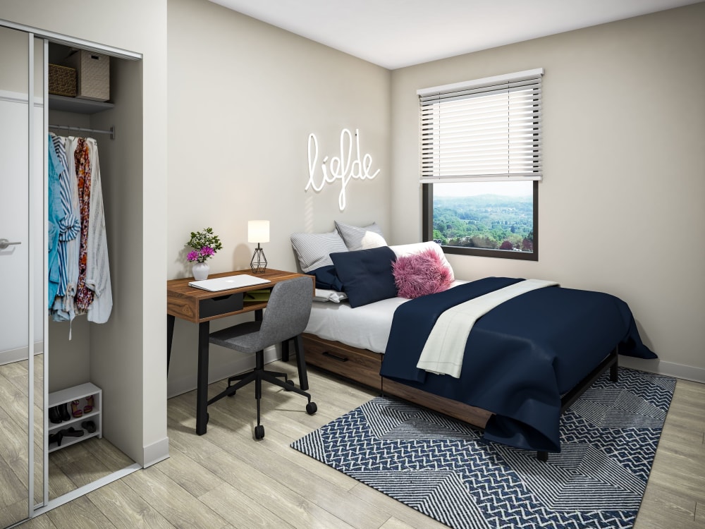 Bedroom with a desk to study at HERE State College in State College, Pennsylvania