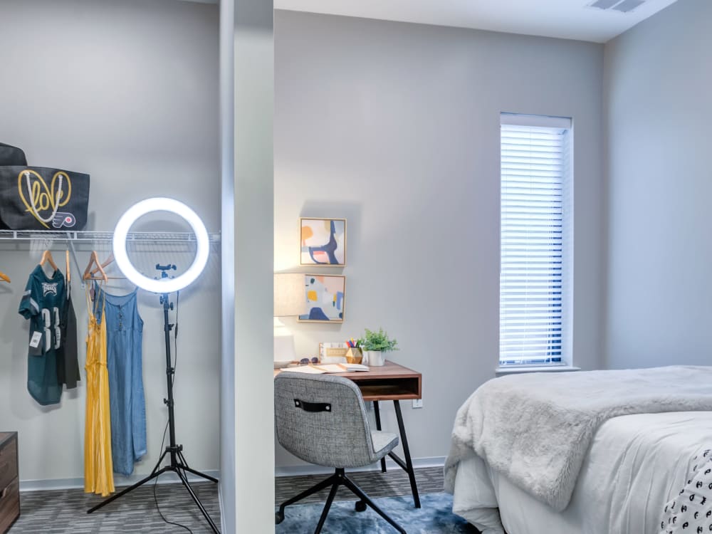 Bedroom with a study space at The Link University City in Philadelphia, Pennsylvania