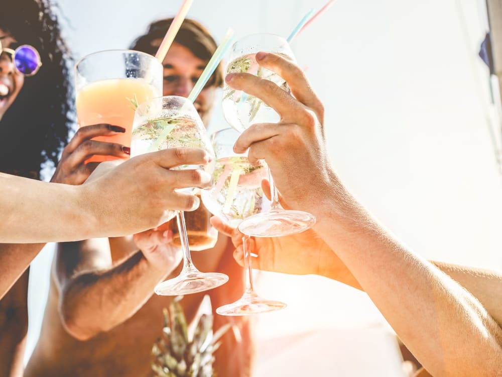 Friends enjoying drinks together near Gramercy Scottsdale in Scottsdale, Arizona
