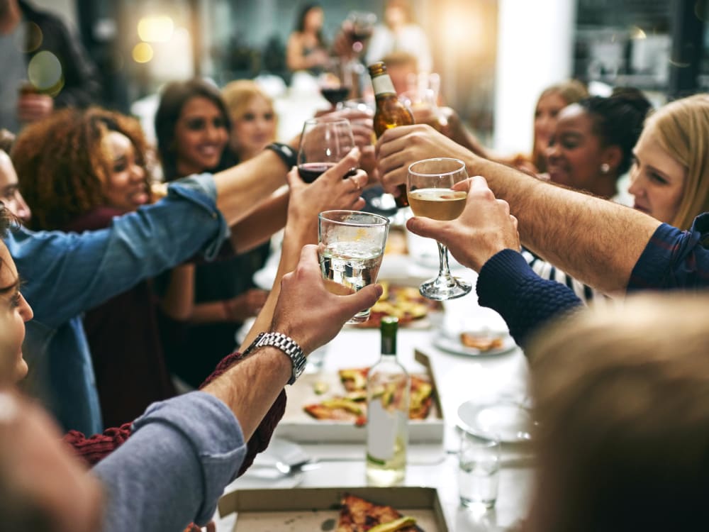 Friends gathering for food and drinks at Knoll at Fair Oaks in Fairfax, Virginia