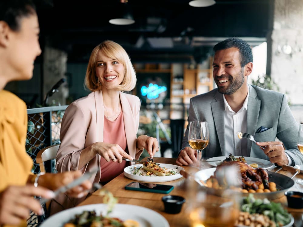 Residents enjoy a meal out with friends near Quintana at Cooley Station in Gilbert, Arizona