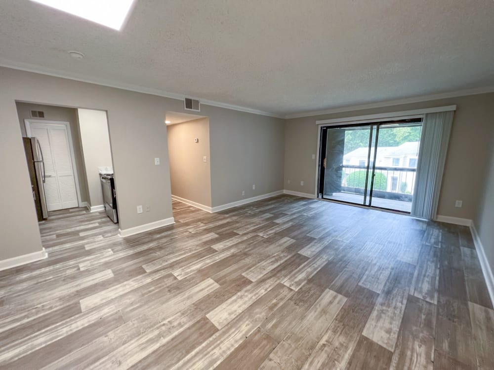 Wood flooring in a spacious apartment living room at Pinewood Station in Hillsborough, North Carolina