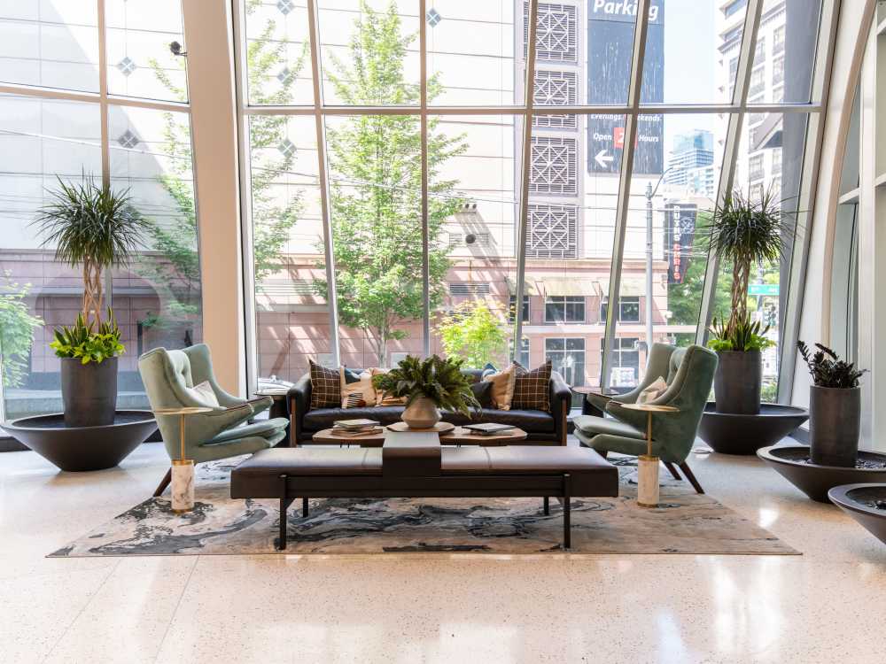 Contemporary reception area with large windows at Tower 801 in Seattle, Washington