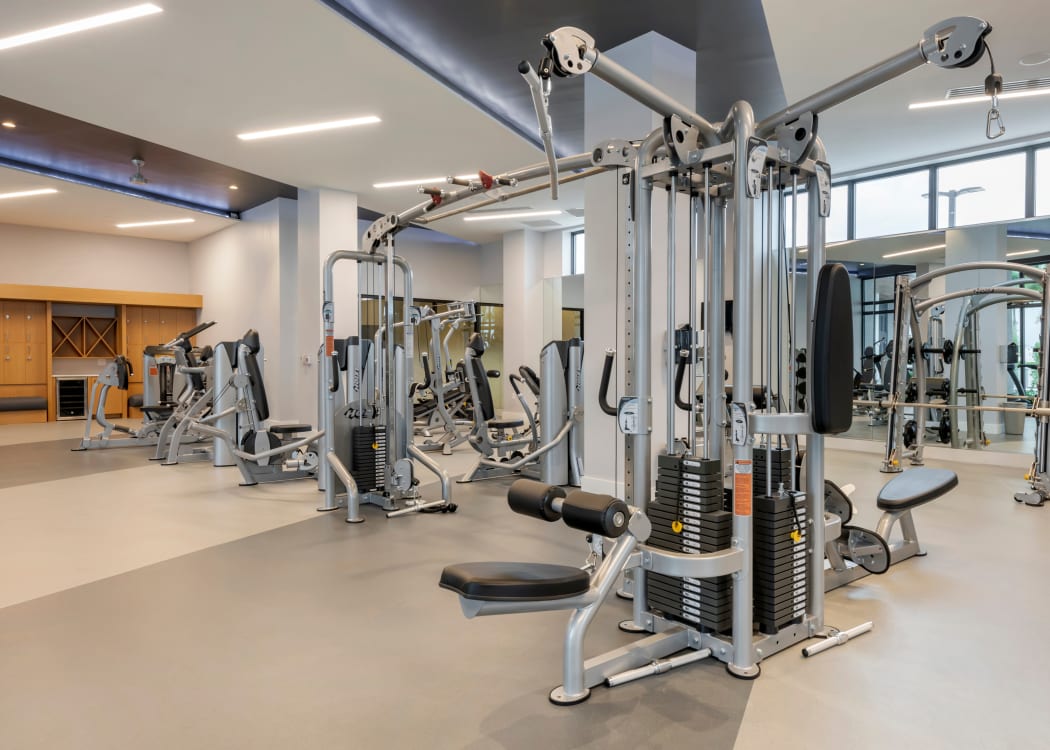 Residents staying in shape in the onsite fitness center at Motif in Fort Lauderdale, Florida