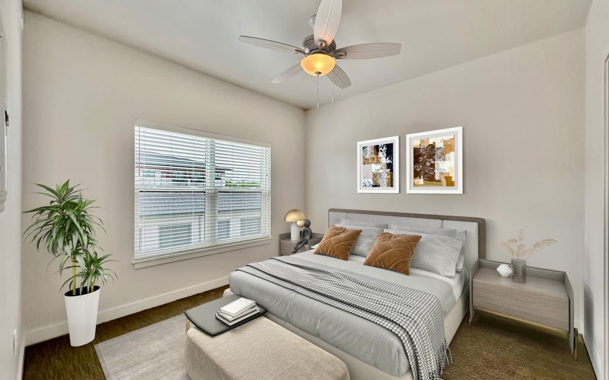 Cozy bedroom in a model home at Stratford Pointe in Waukee, Iowa